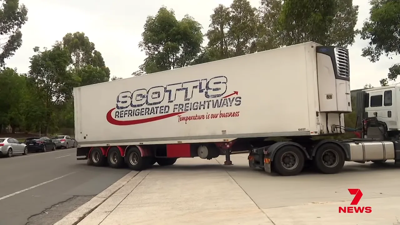 Refrigerated freight truck on the road carrying perishable goods for food supply