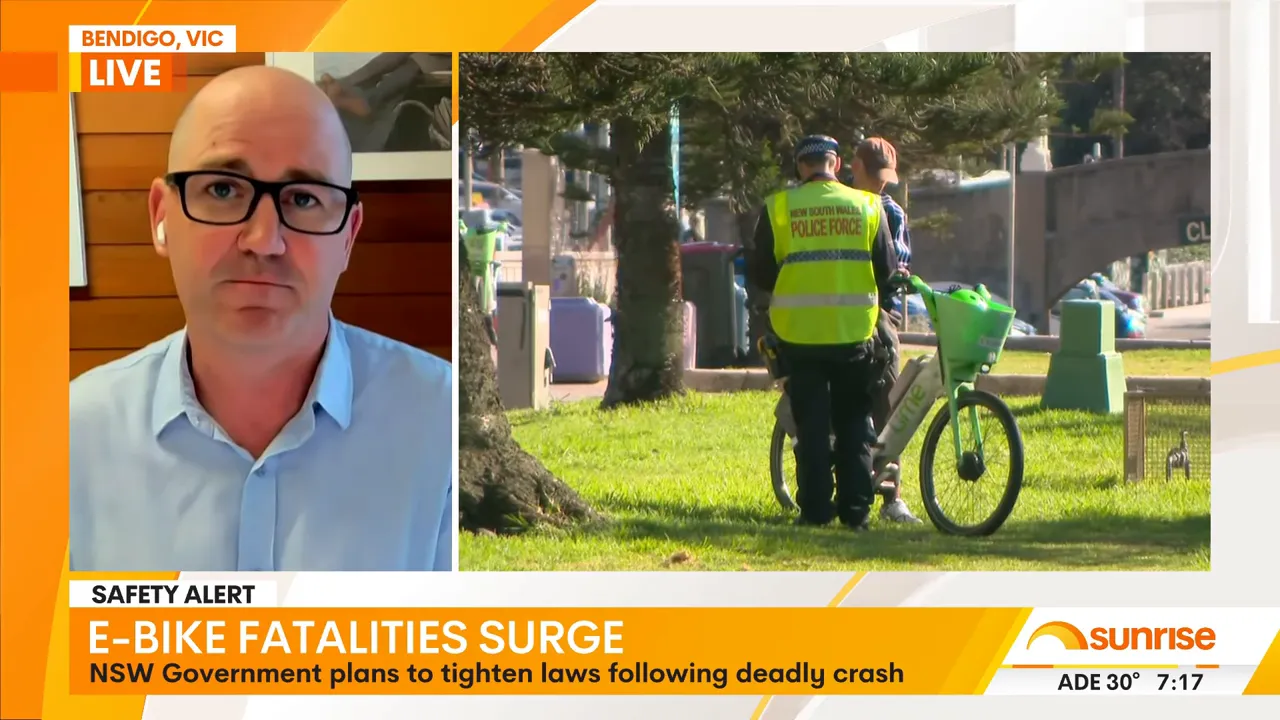 New South Wales police officer speaking to an e-bike rider beside a green Lime hire bike in a park area.