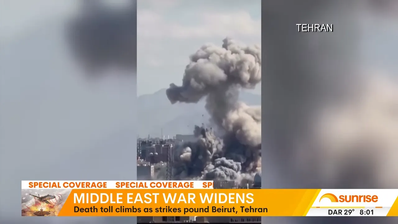 Large plume of smoke rising over Tehran after a strike