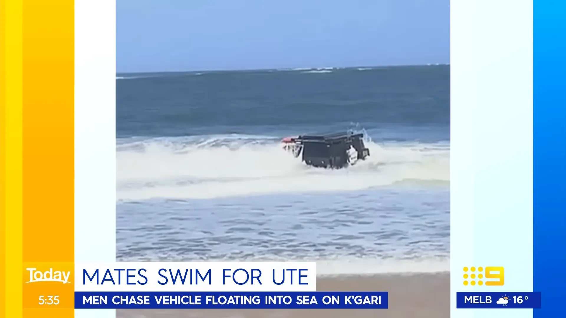 Toyota Hilux rolling into the surf as waves crash over it