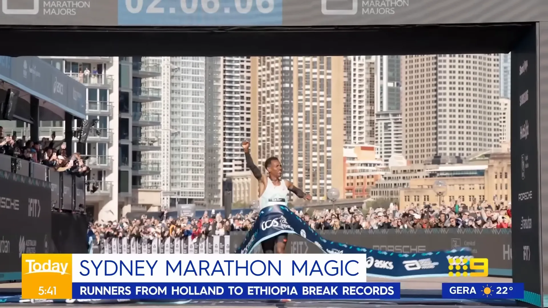 Runners crossing the finish line at the Sydney Marathon