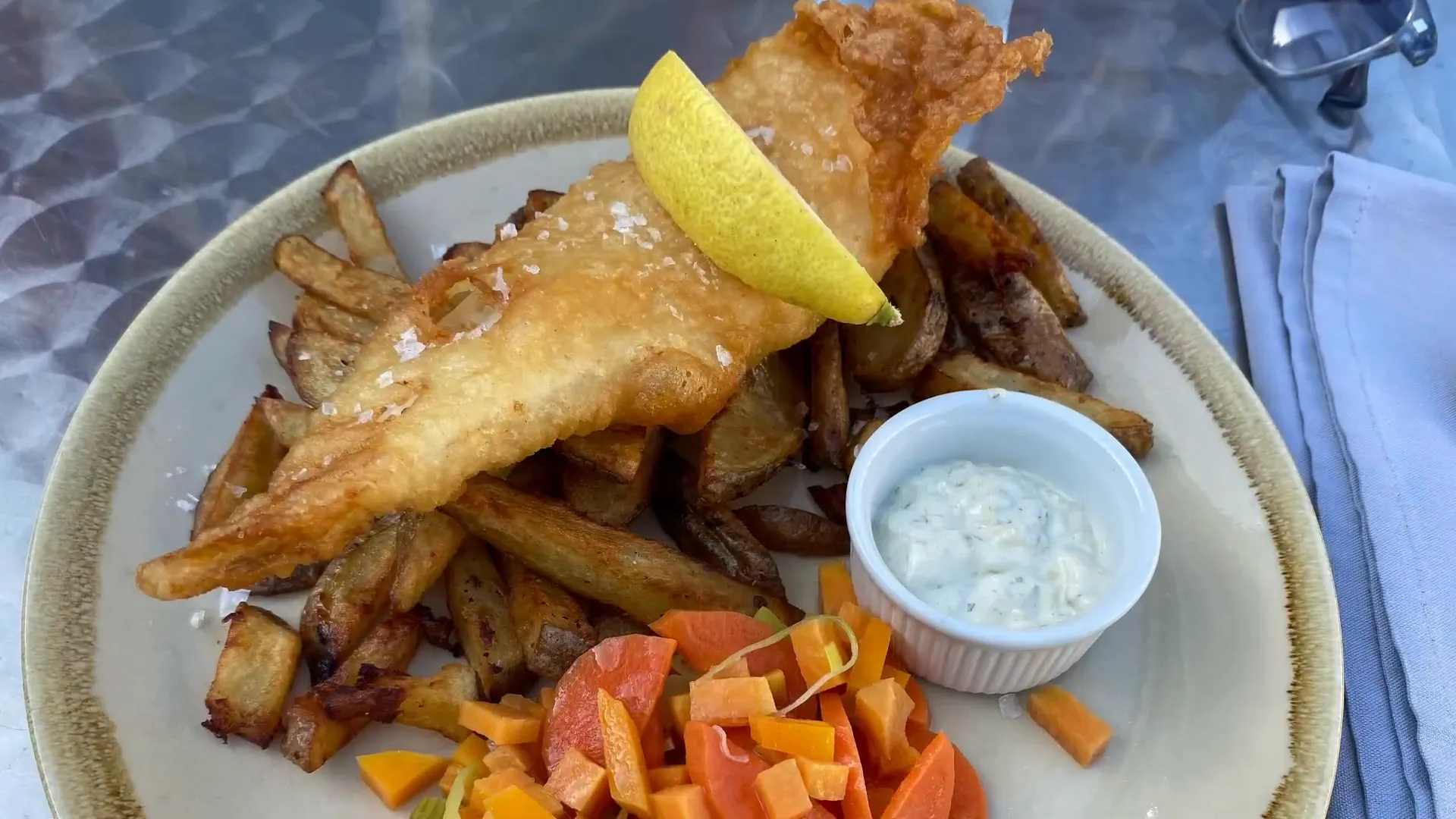 Enjoying fish and chips dinner in Douglas