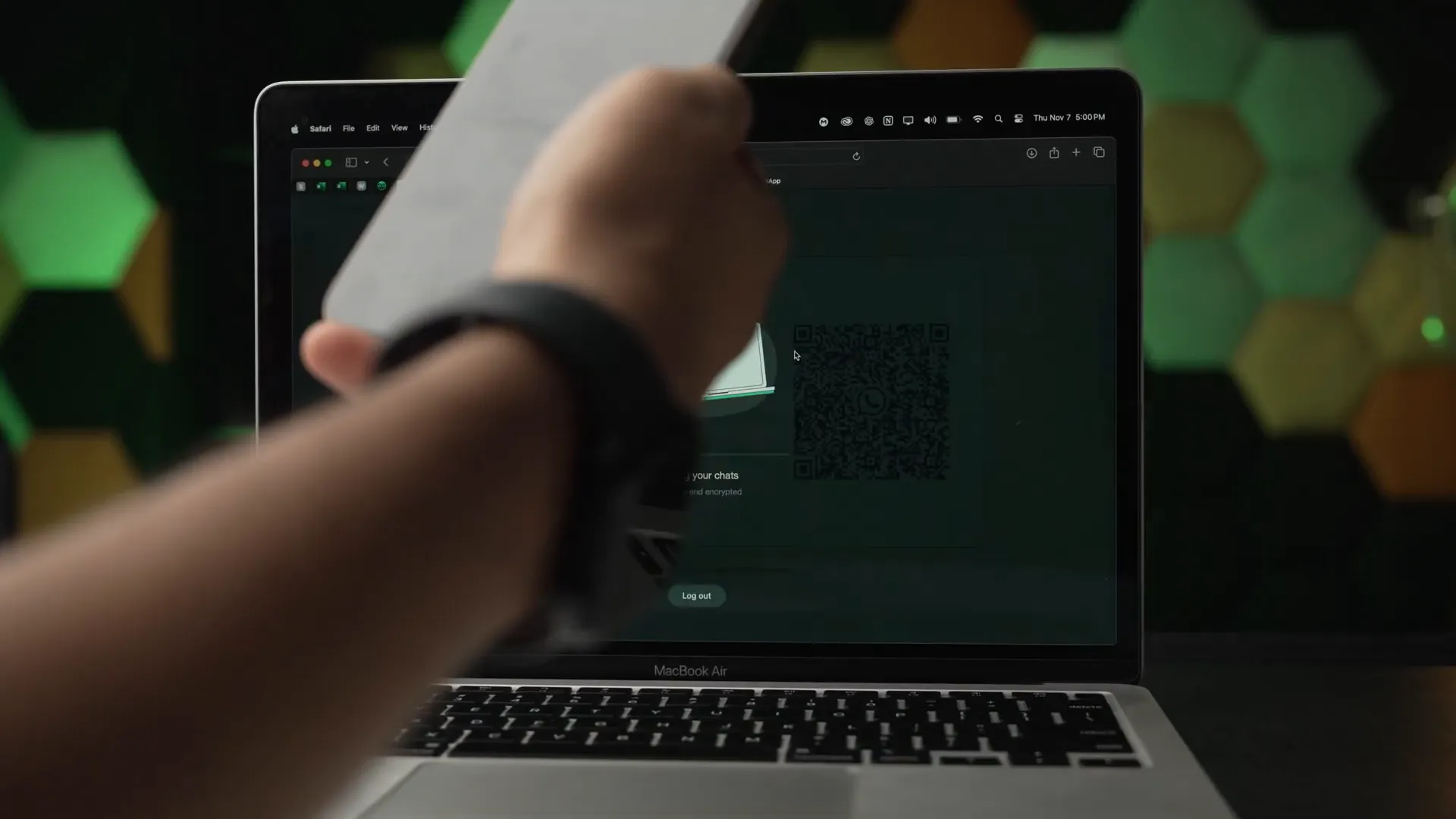 WhatsApp Multi-Device Feature: A Comprehensive Guide 2 Scanning QR code on MacBook to link WhatsApp