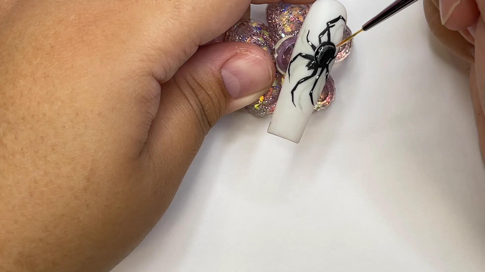 Spooktacular Halloween Nails: Easy Designs for Beginners 5 Finished realistic spider nail design