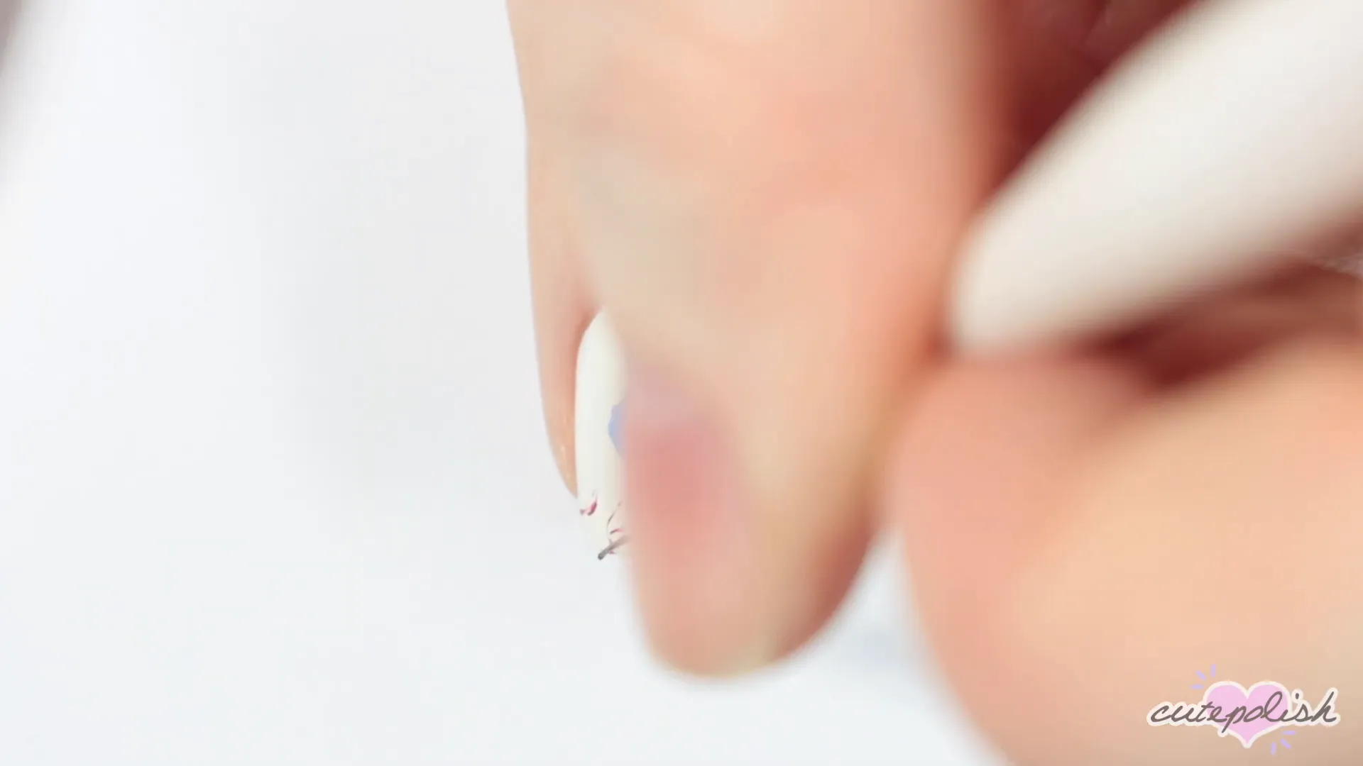 Spooktacular Nail Art: 10 Easy Halloween Designs 3 Adding red lines to create a bloodshot effect around the eyeball.