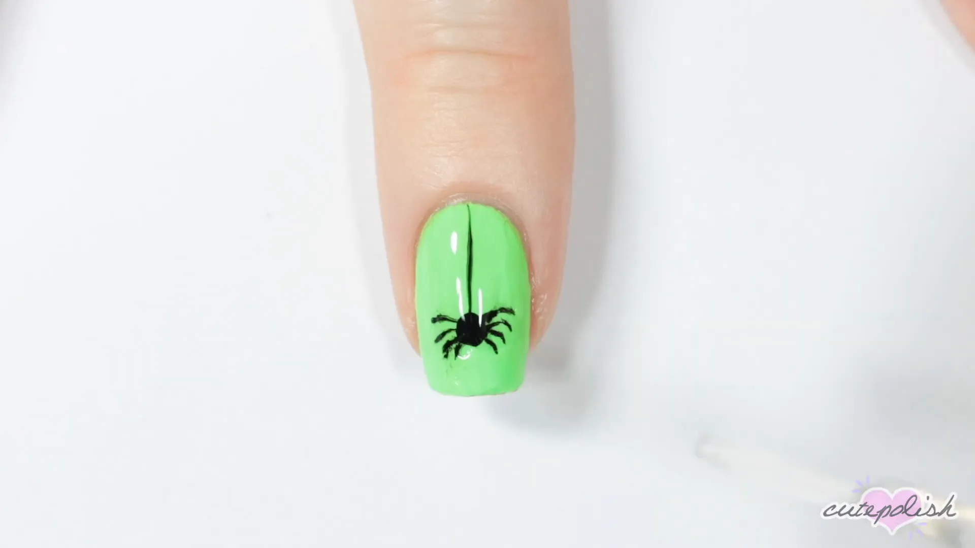 Spooktacular Nail Art: 10 Easy Halloween Designs 11 Starting the blood drip design with black base and red dots.
