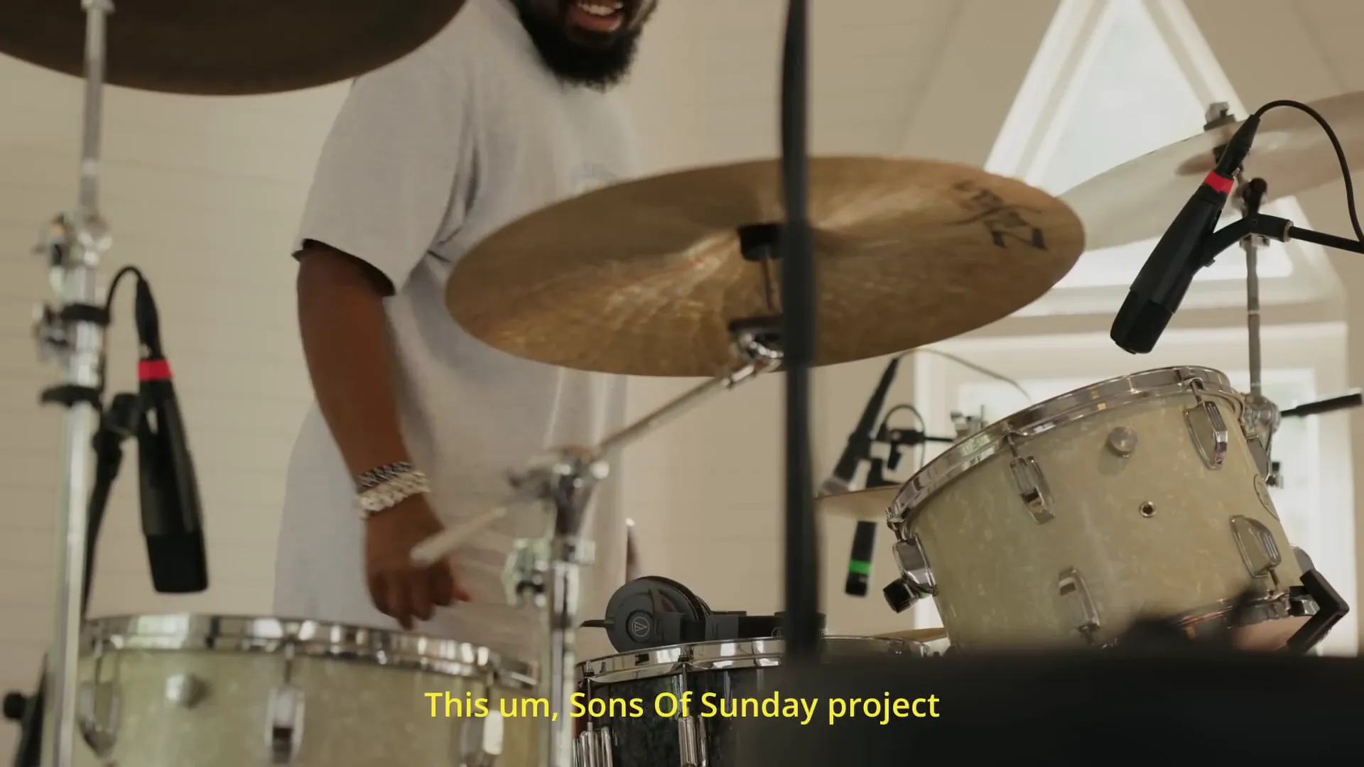 Drummer destroying the drum kit in a moment of creative chaos