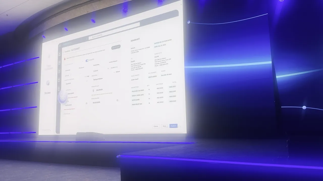 Large screen showing a bright invoice management interface with rows and columns of accounting data