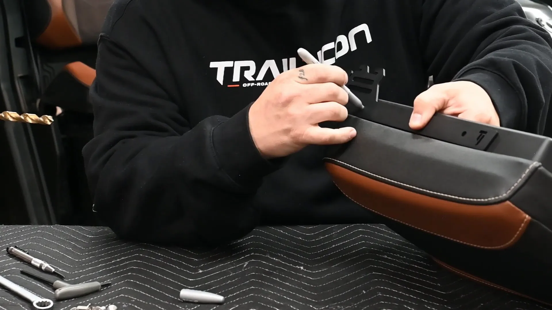 Marking holes on console arms with Sharpie