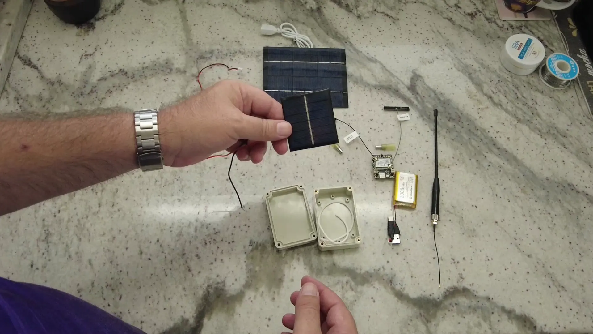Active cooling system with fan and solar panel