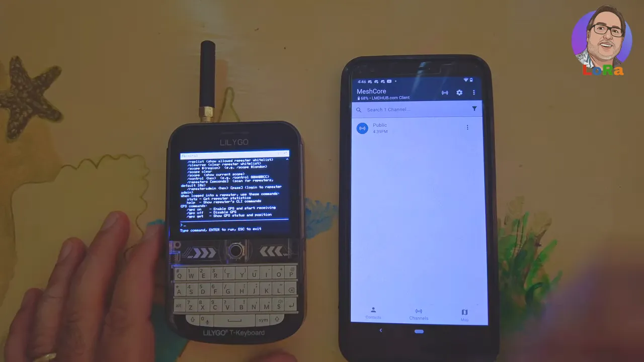 LilyGo T‑Deck showing a clear terminal command list and a phone displaying MeshCore channels; minimal motion blur.