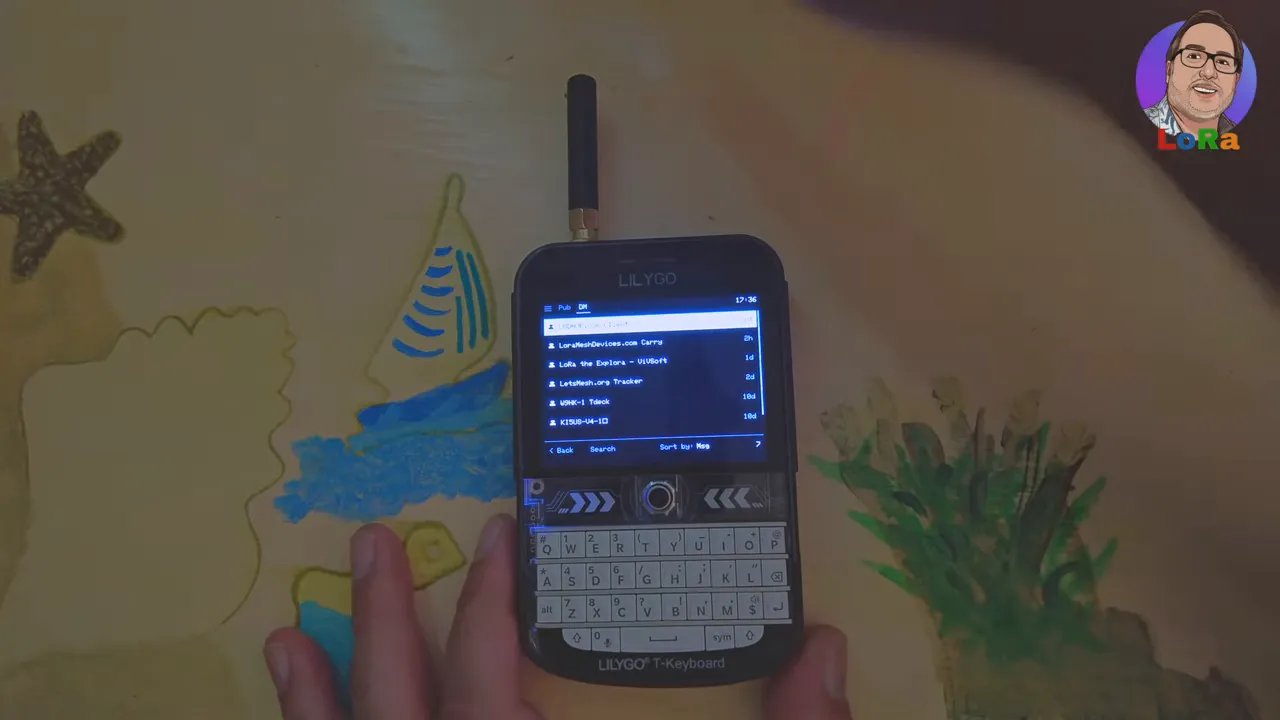 LilyGo T‑Deck screen clearly displaying a list of chat channels and direct messages