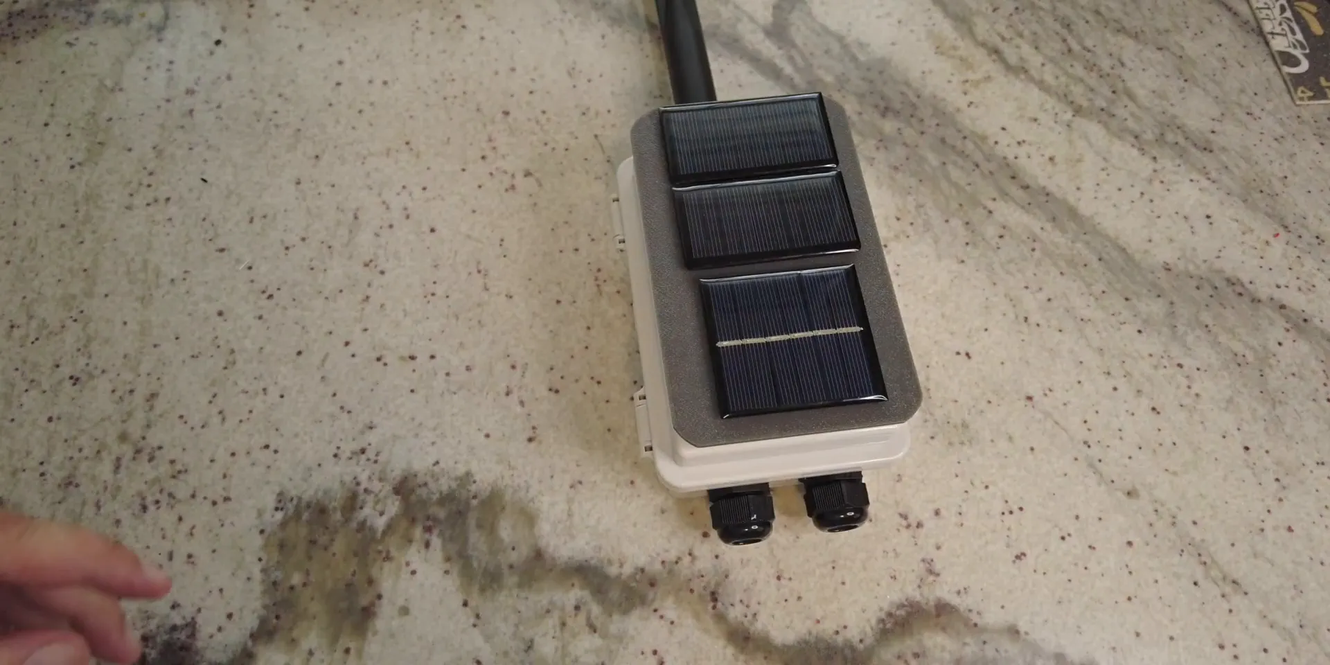 Back of solar node with cable tie holders for mounting