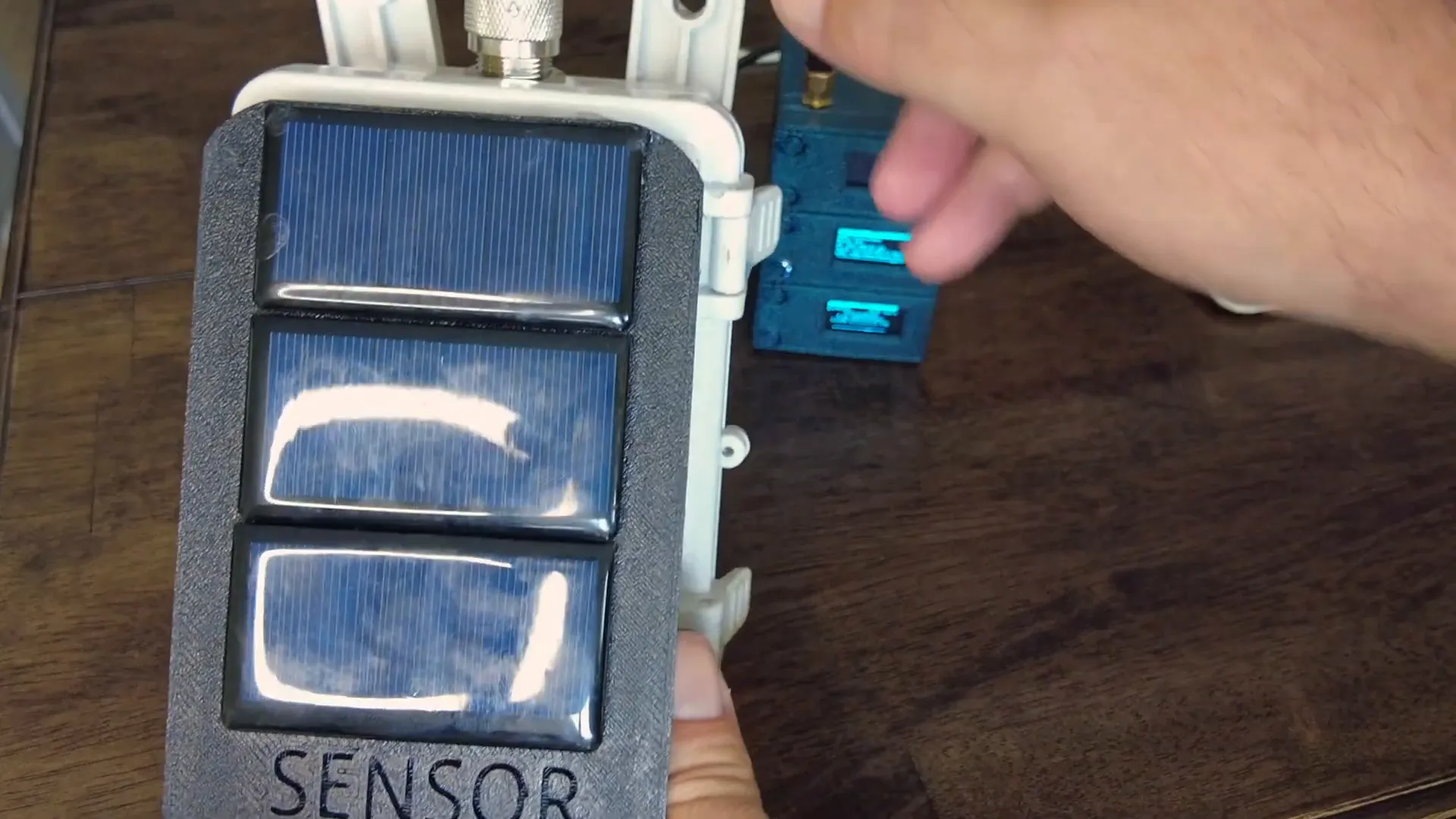 Ultrasonic water sensor with small solar panels used for remote monitoring
