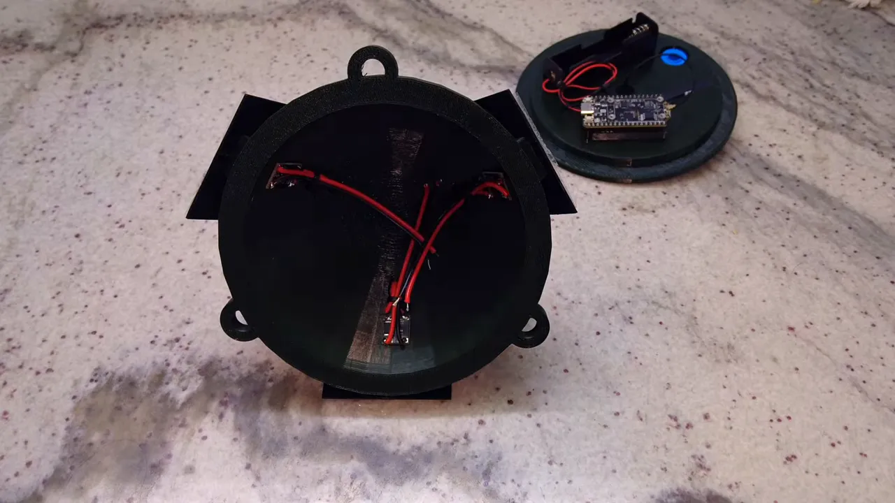Assembled Solar Meshtastic tree node internals with wiring inside enclosure and Heltec V4 board for BAT and SOL