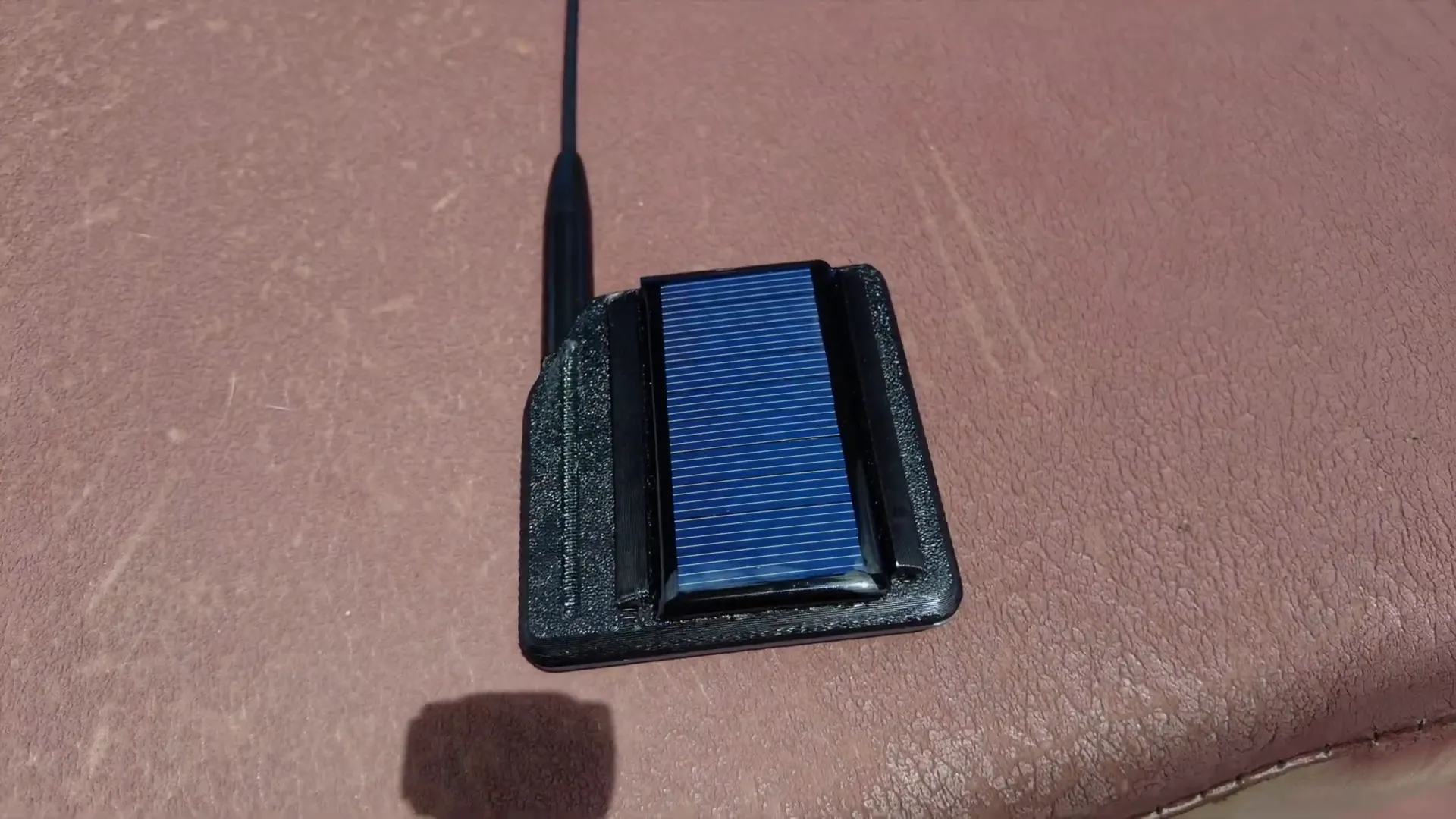 Placing the solar node in the sun to test charging