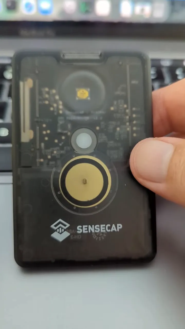 SenseCAP T1000‑E front view showing antenna pad, sensor window and SenseCAP logo