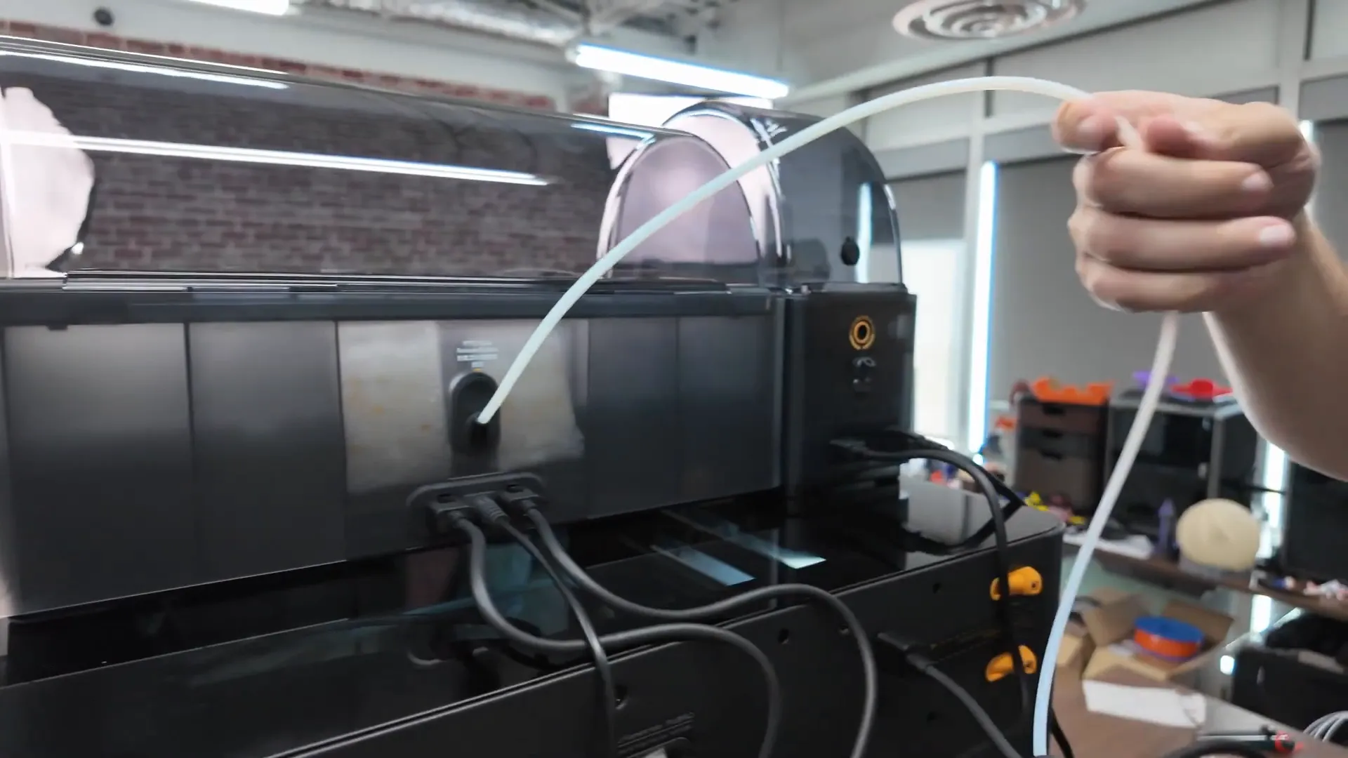 Inserting PTFE tubes and clipping on the external spool holder