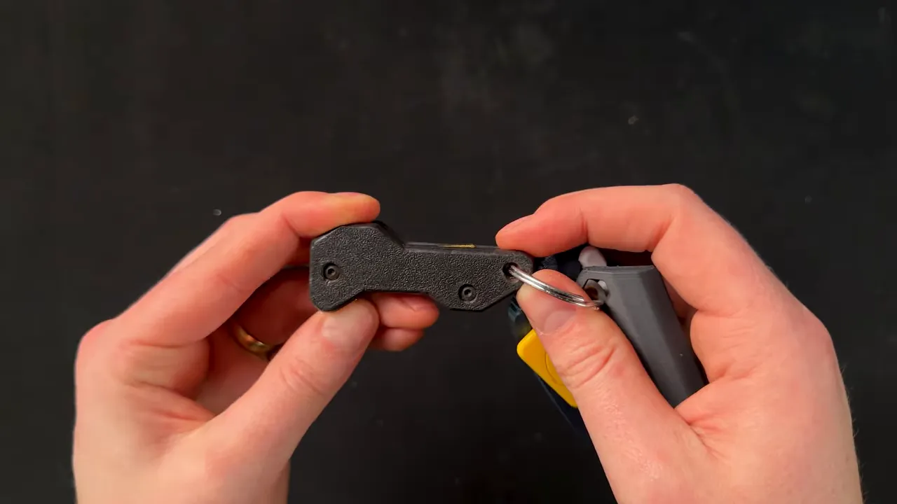 3D printed shopping cart key with flexible hinge