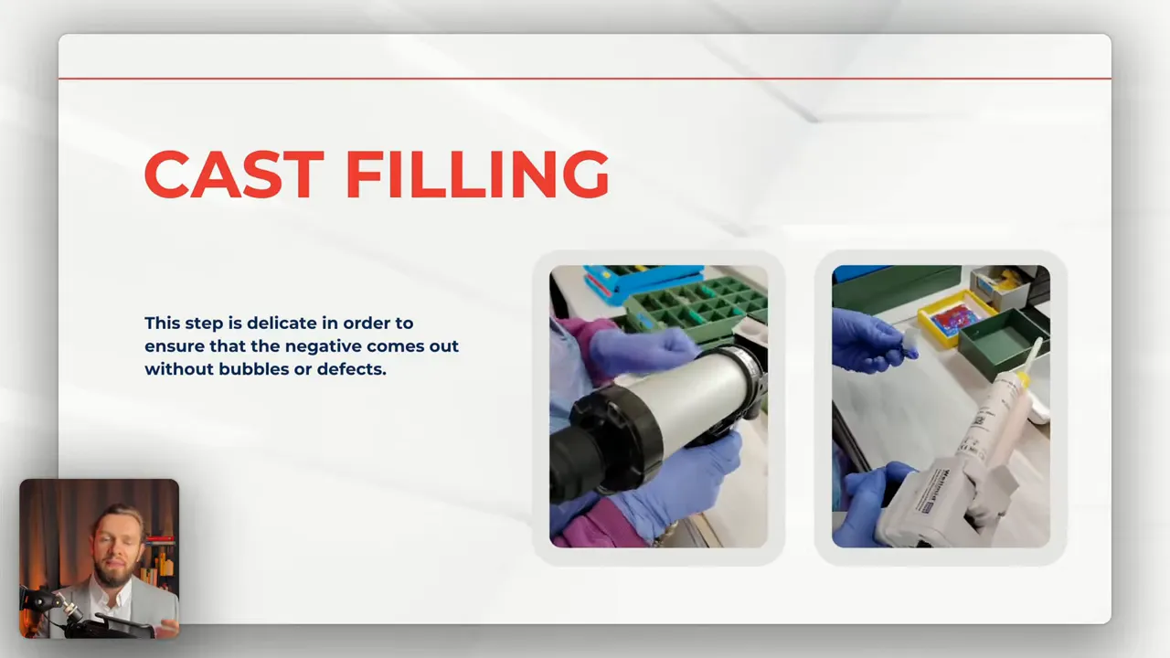 Close-up of gloved hands using a dispensing gun and syringe to fill a cast