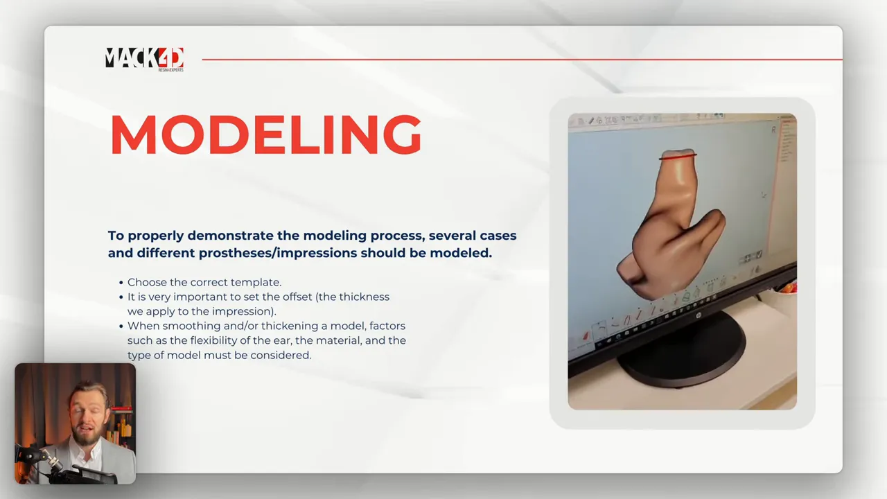 Presentation slide titled 'MODELING' with bulleted instructions on the left and a clear photograph of a computer monitor displaying a rendered 3D ear/impression model in brown on the right.