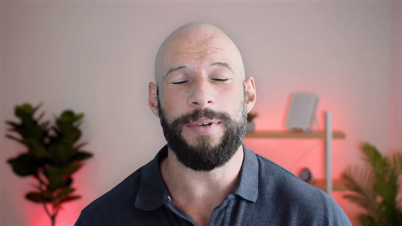 Presenter giving closing remarks in a softly lit home studio with red backlighting