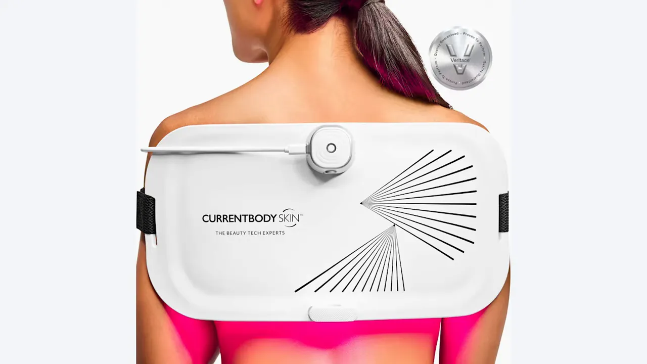 CurrentBody flexible red light therapy panel wrapped over a person’s upper back