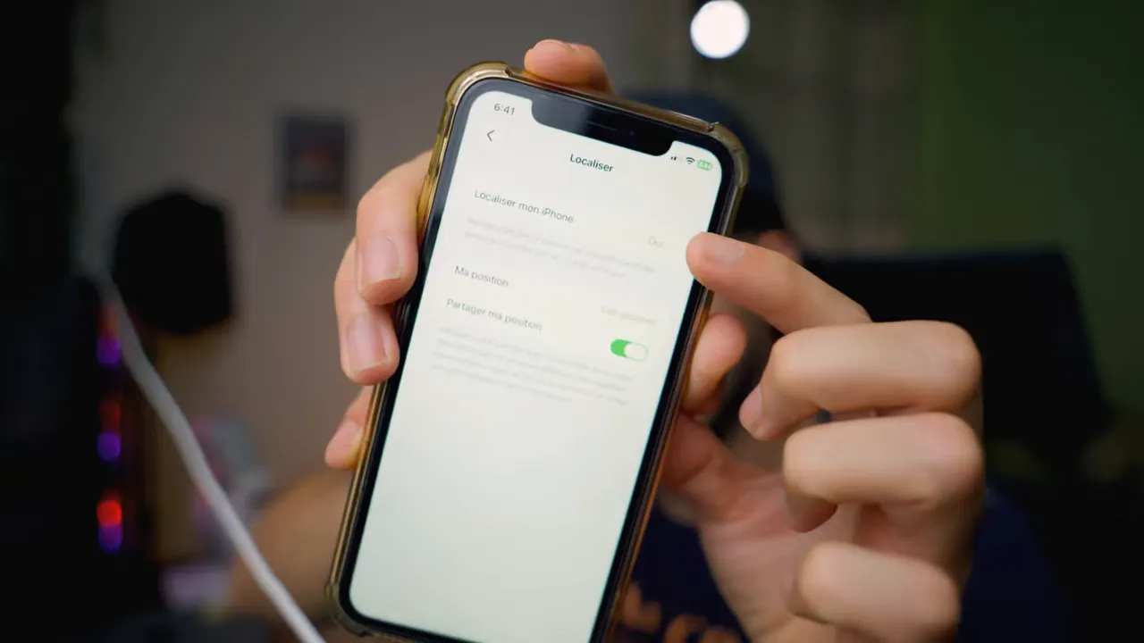 iPhone affichant les réglages Localiser avec une option de localisation active