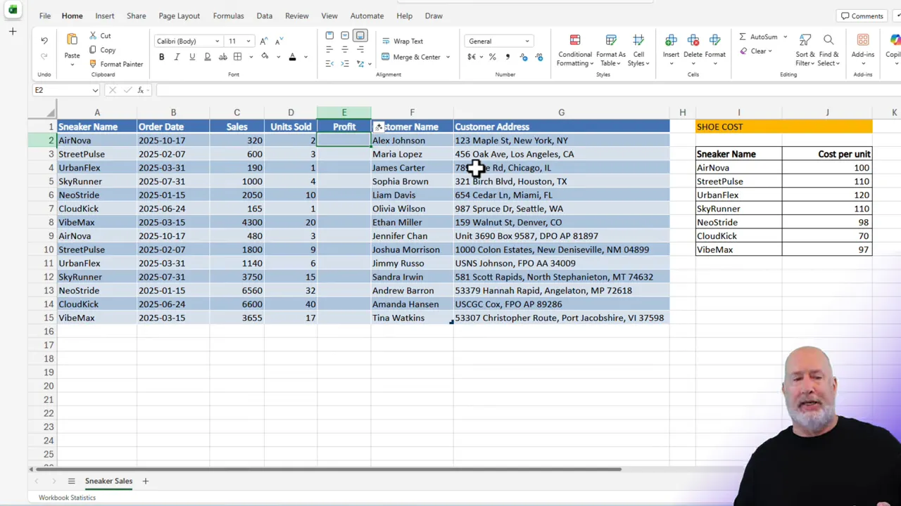 Clear view of an Excel table with the Profit column header entered and the lookup table with unit prices on the right.