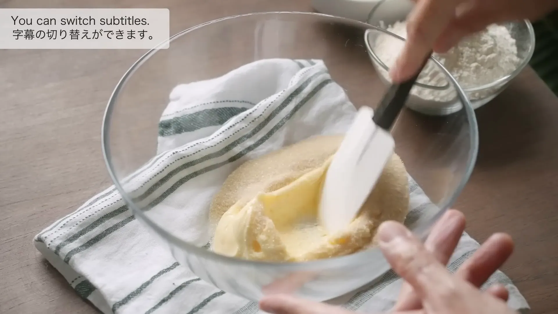 Mixing sugar and salt with softened butter