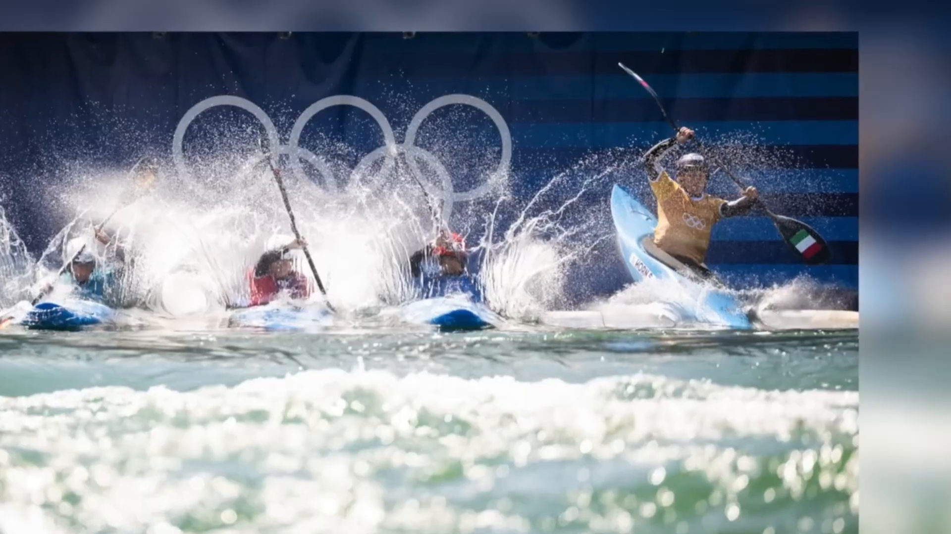 Kayak cross competitors in action