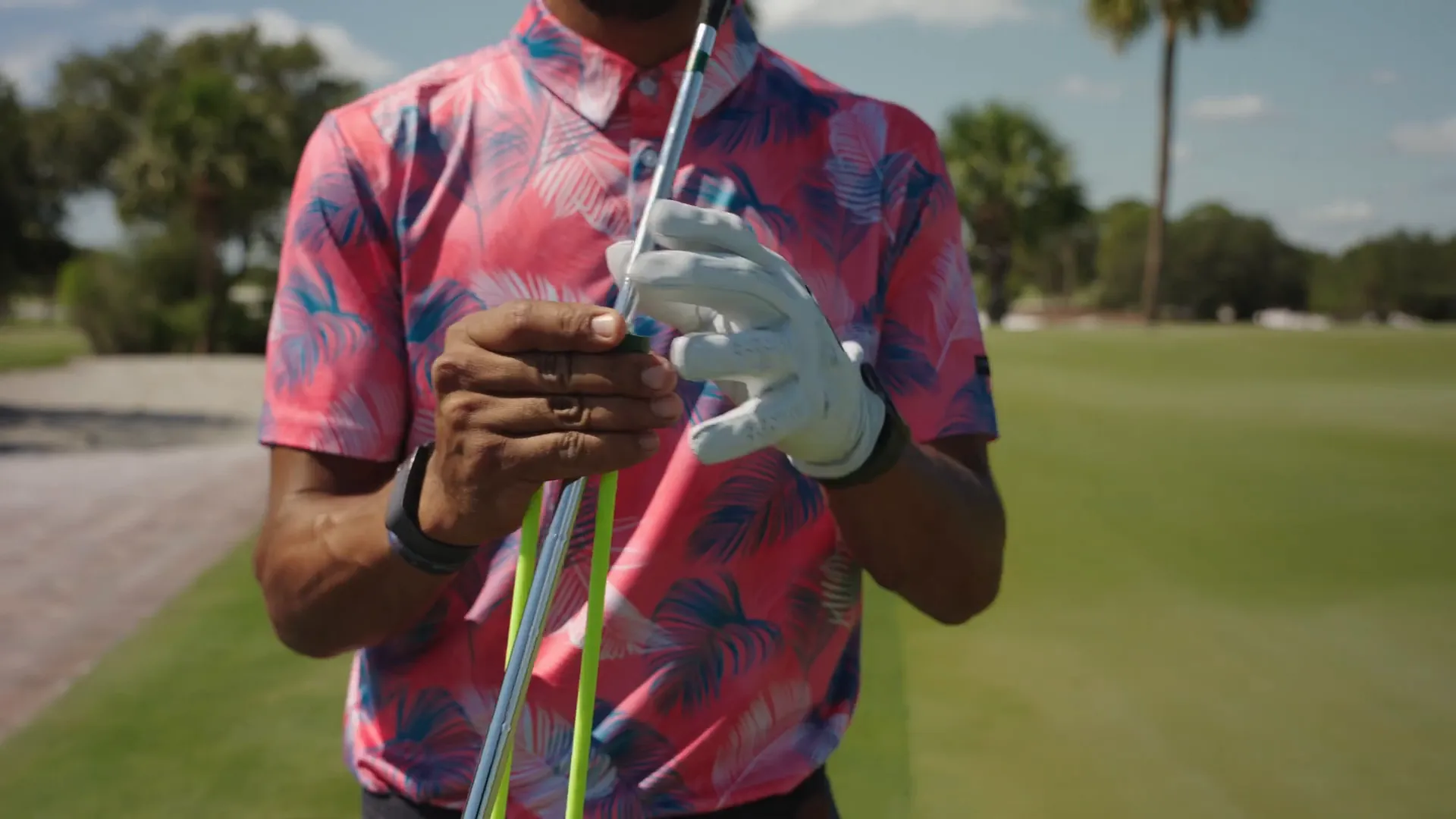 Using the training aid with a pitching wedge for chipping