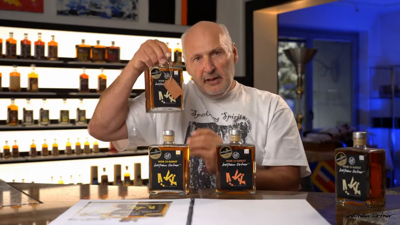 WOB 24 Karat bottle with leather pendant hanging from the neck, displayed for personalization