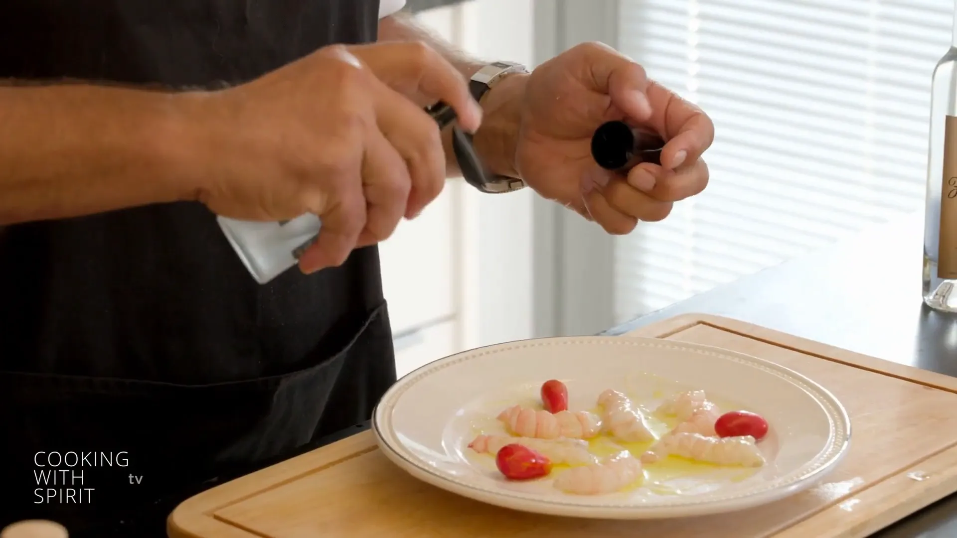 Spray bottle of Yellow Muscatel distillate being used to perfume the dish