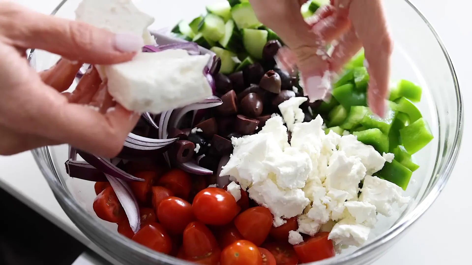 Crumbling feta cheese