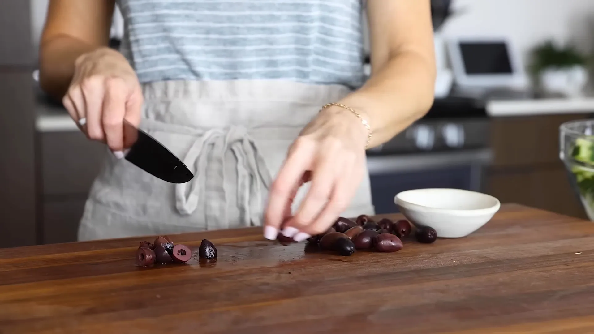 Slicing Kalamata olives