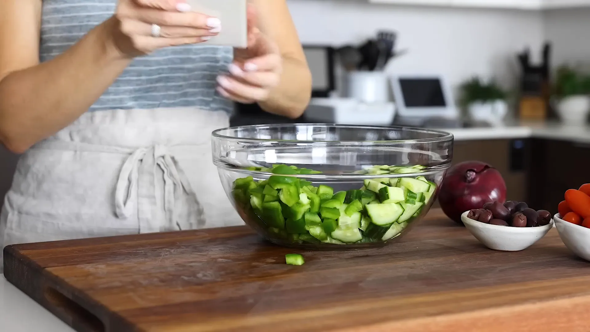 Adding bell pepper to the bowl