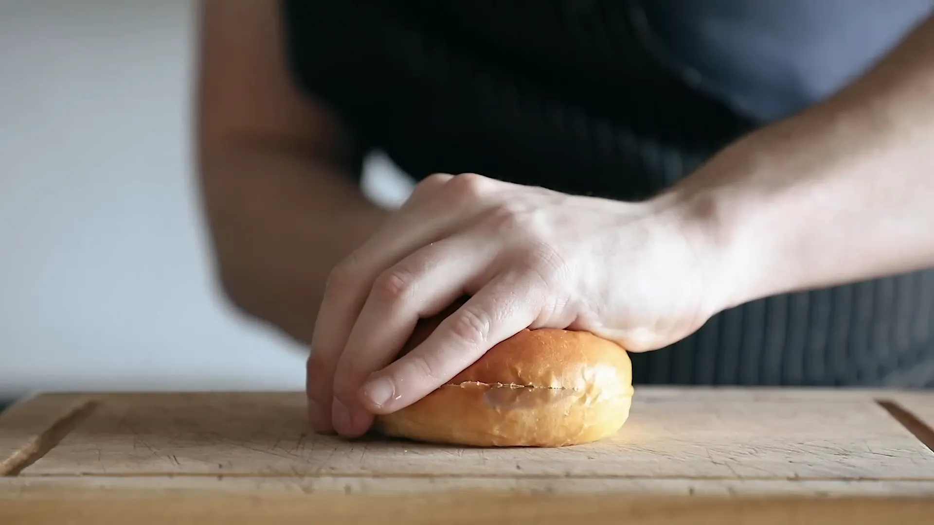 Opening shot of the iconic Popeyes chicken sandwich with pickles