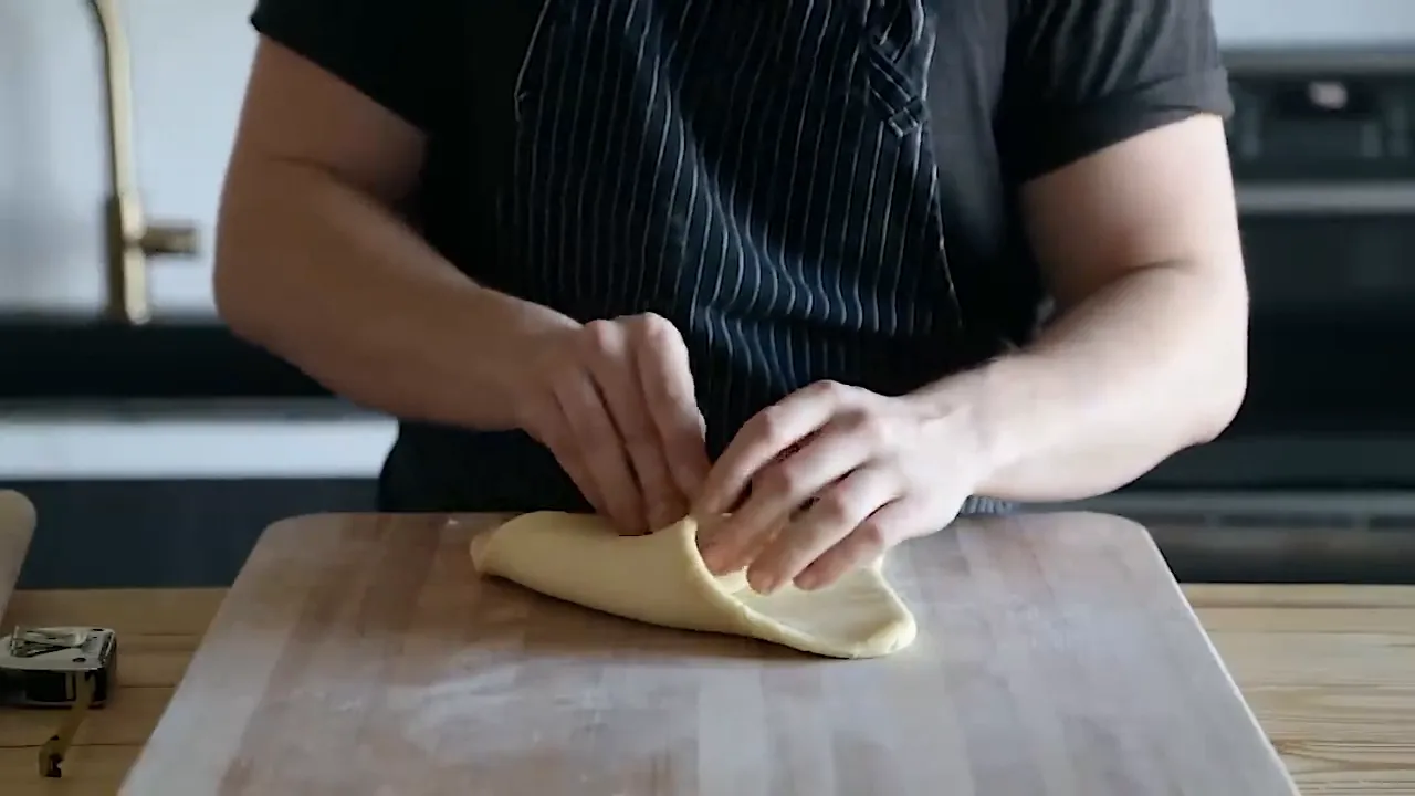 Butter block encased in dough ready for rolling