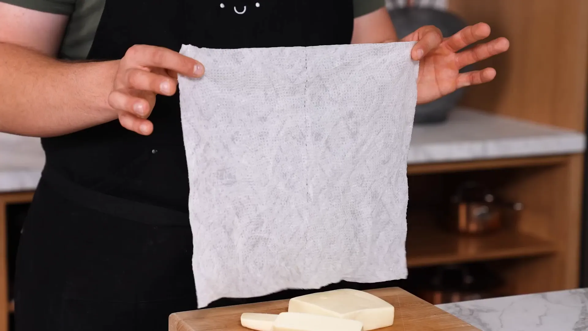 Damp towel under cutting board to prevent slipping