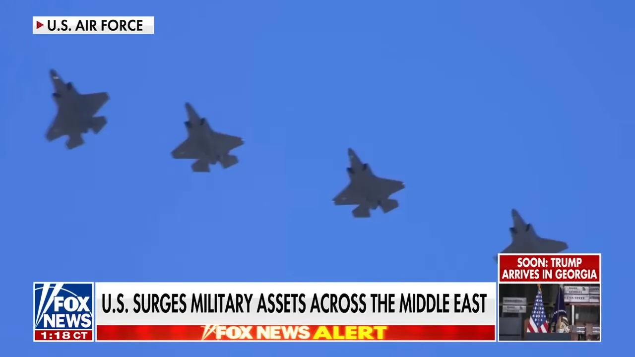 Four U.S. fighter jets flying in formation against a clear blue sky