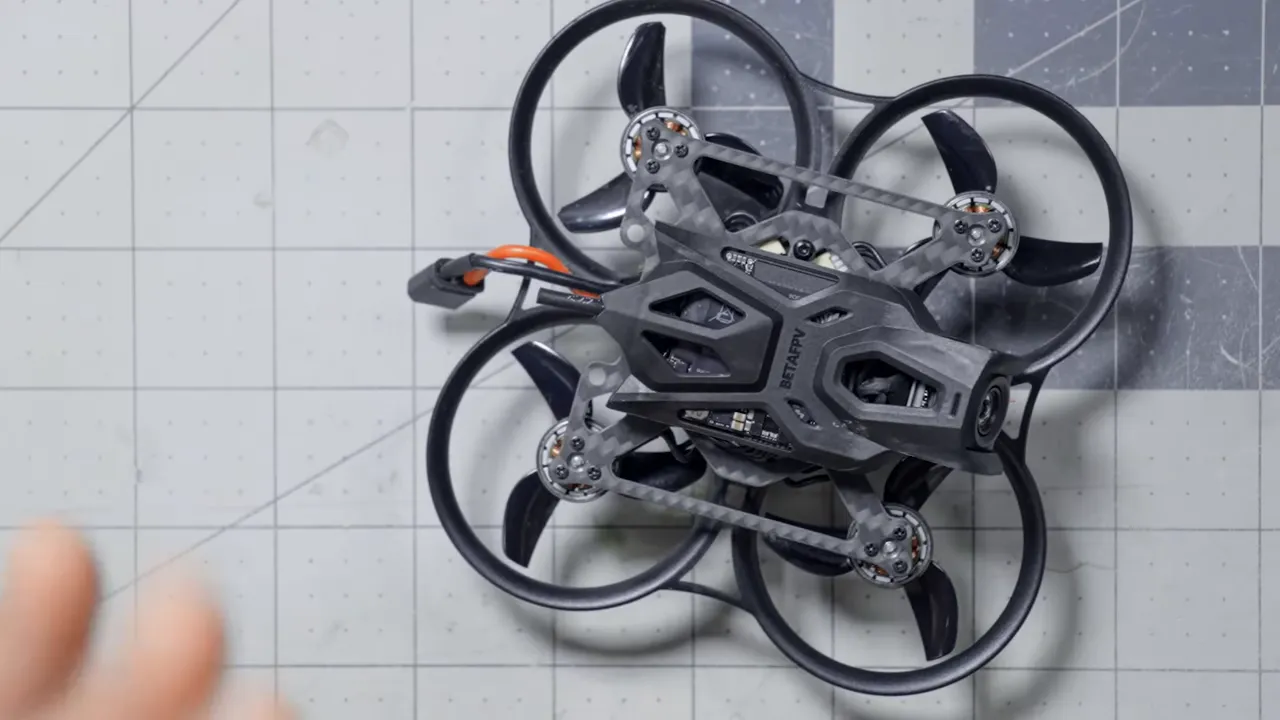 Top-down view of BetaFPV Pavo Pico II whoop showing canopy, prop guards and three‑blade props