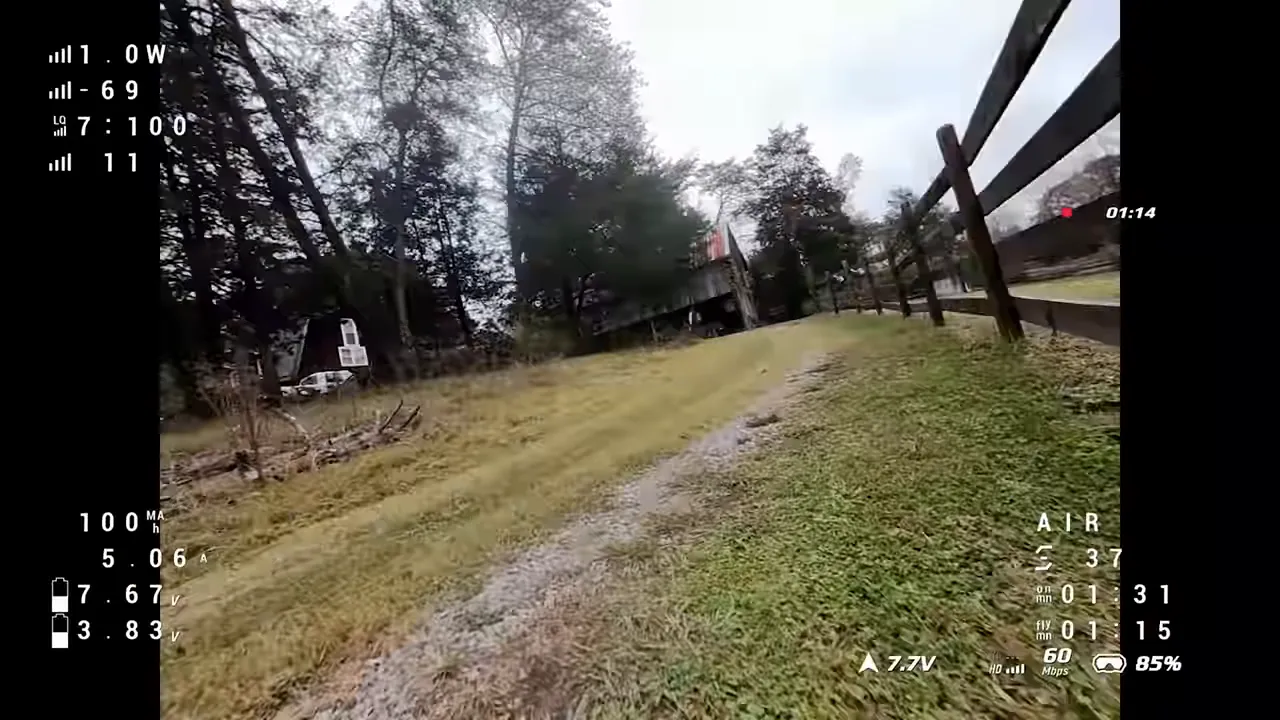 FPV cinematic forward pass showing clear telemetry overlay and stable horizon