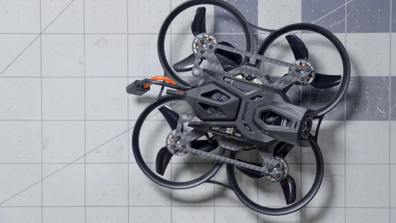 Top-down view of BetaFPV Pavo Pico II whoop showing canopy, prop guards and three‑blade props