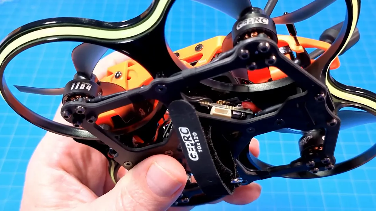 Wider close-up of DarkStar22 underside highlighting the flight controller area and USB connector access