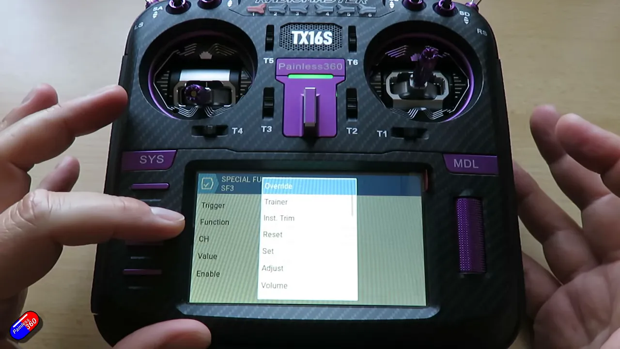 Front view of Radiomaster TX16S showing Special Functions popup menu with Override option visible
