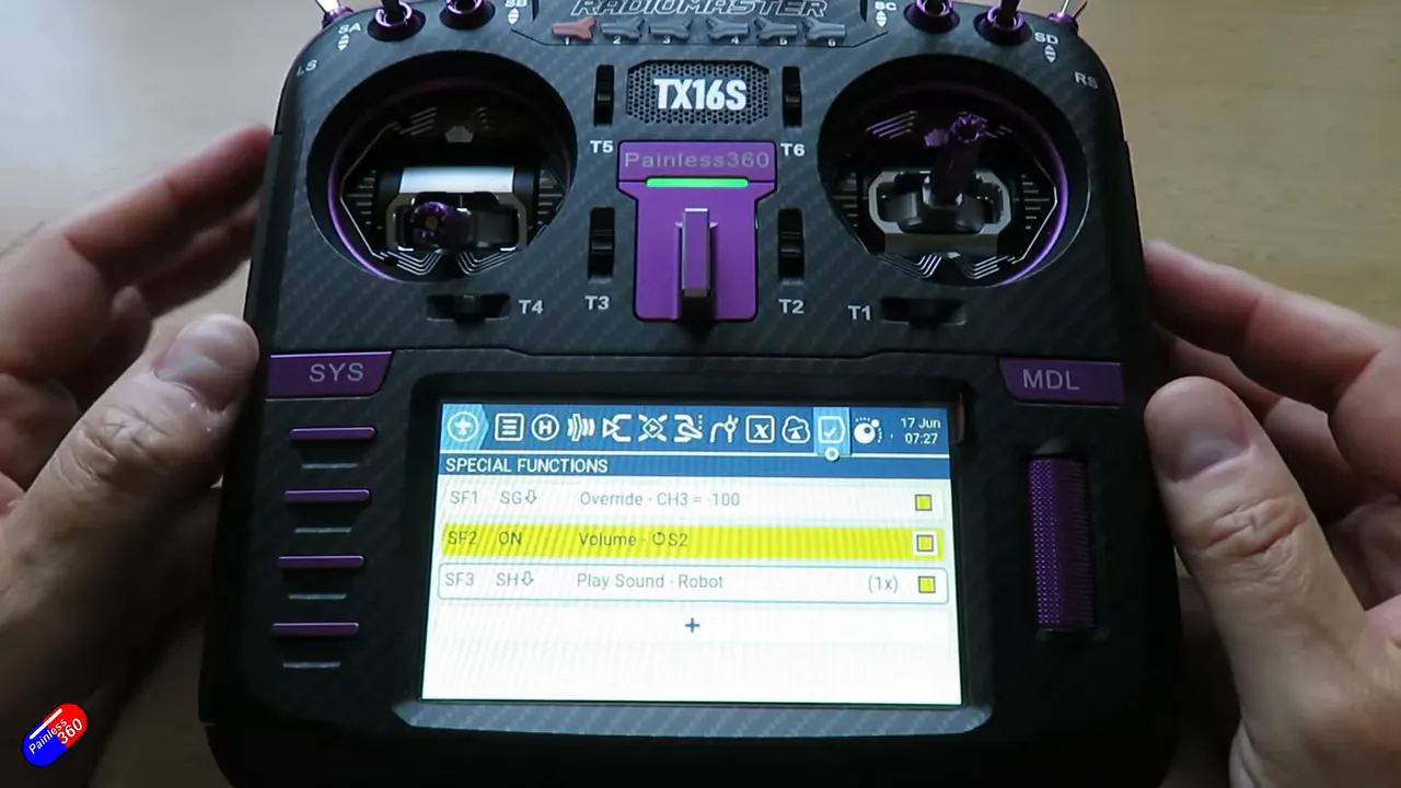 Front view of Radiomaster TX16S with Special Functions list highlighted showing Volume on S2 and Play Sound Robot