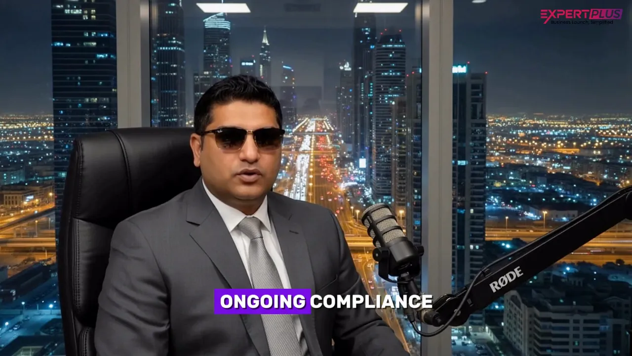 Presenter in an office setting with clear on-screen text 'ONGOING COMPLIANCE'.