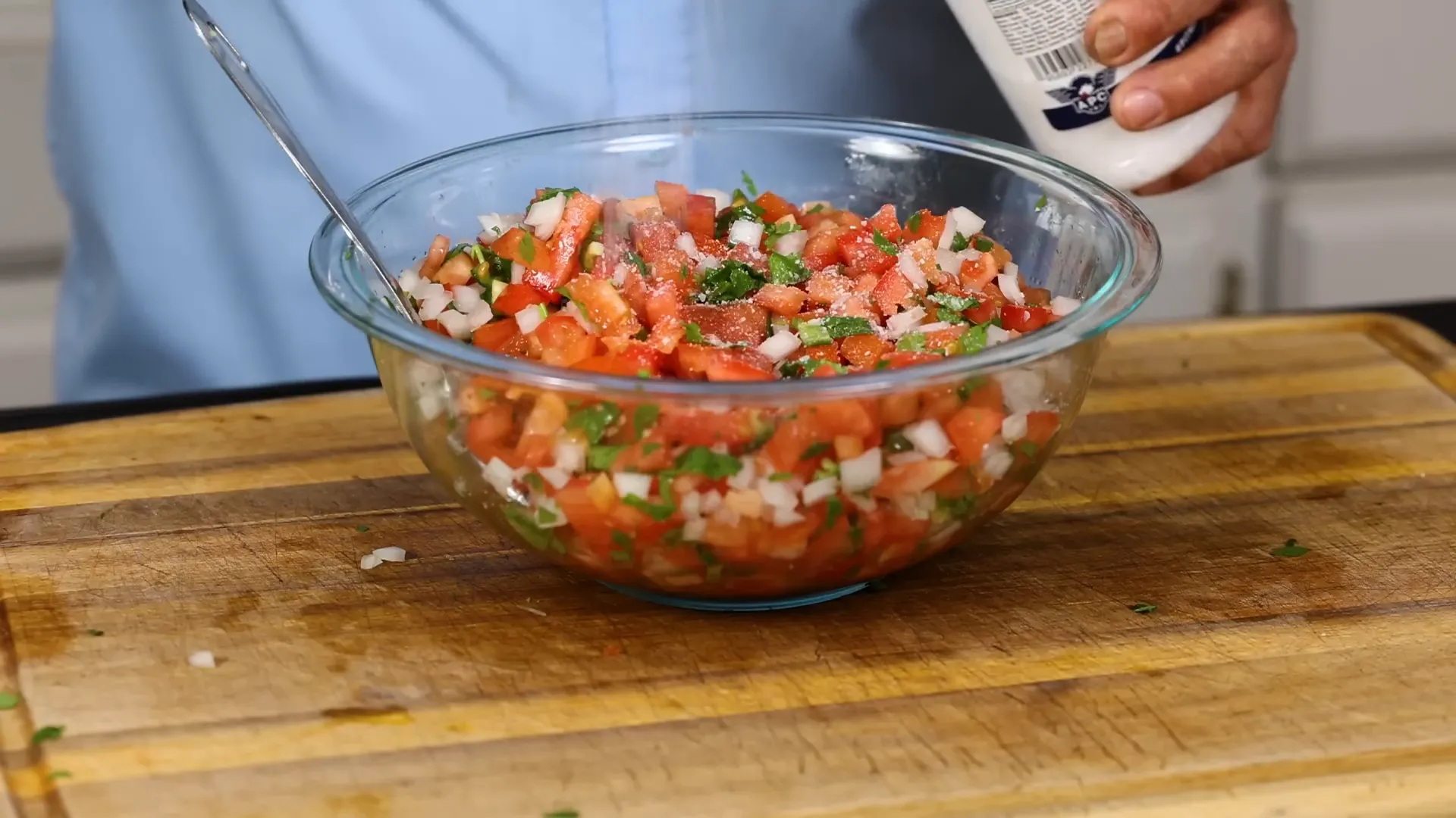 Adding lime juice to Pico de Gallo