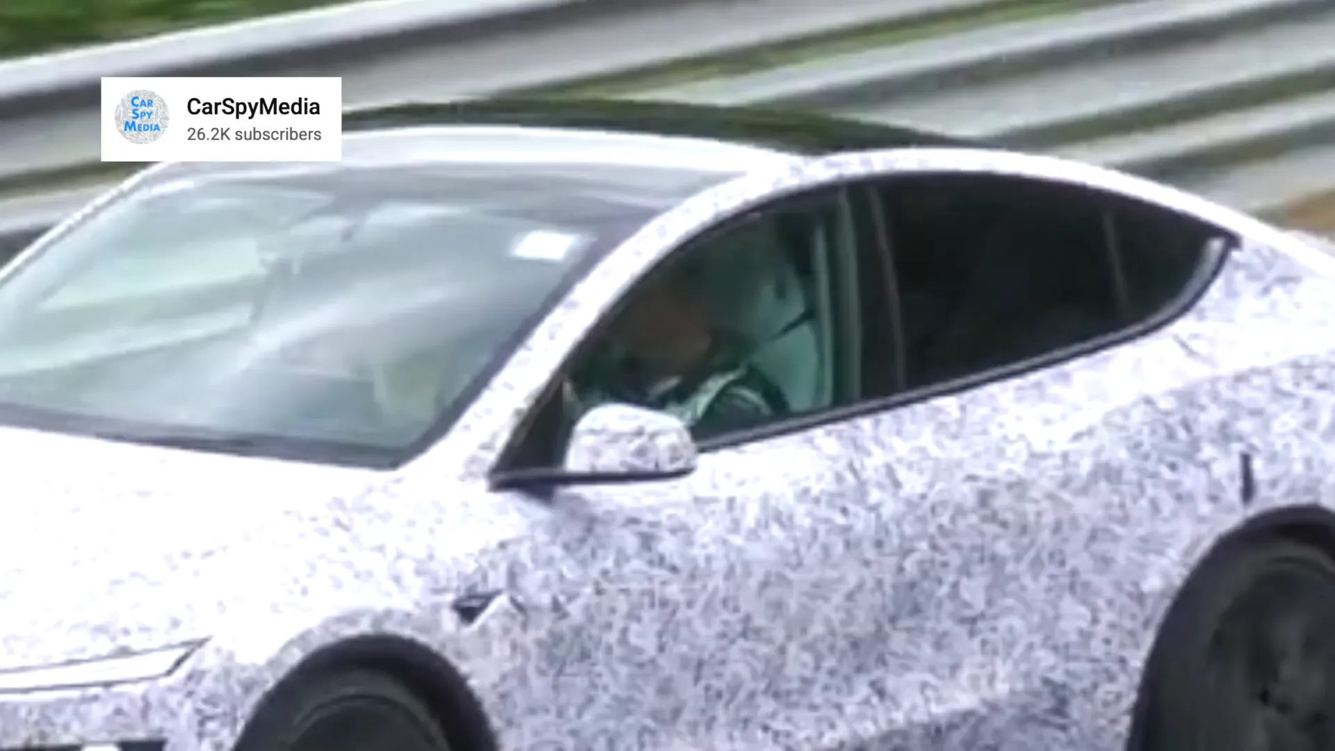 Tesla Model Y performance seats visible during testing